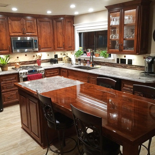 A fully renovated set of kitchen countertops with an epoxy resin coating.