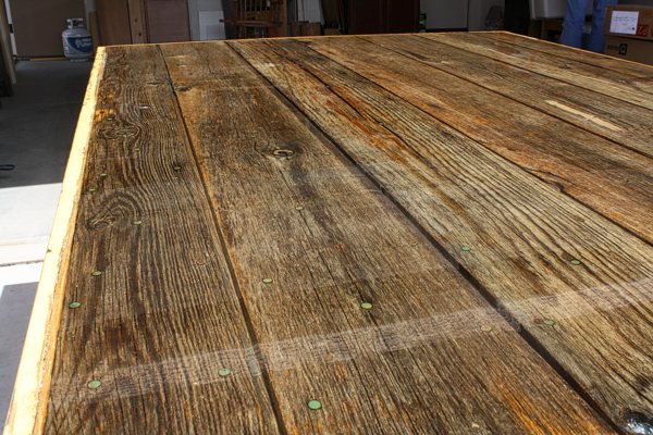 A wooden epoxy resin table top with a perfectly cured finish.