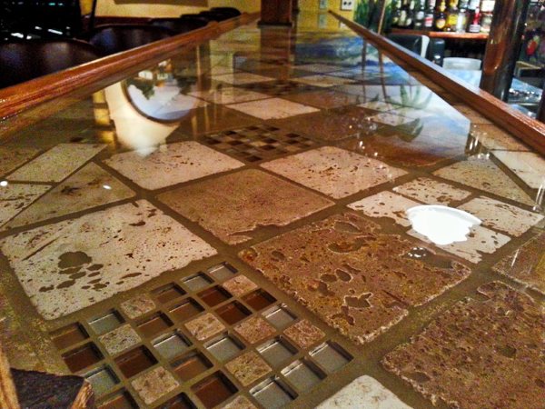 A close-up view of a bar top epoxy finish.